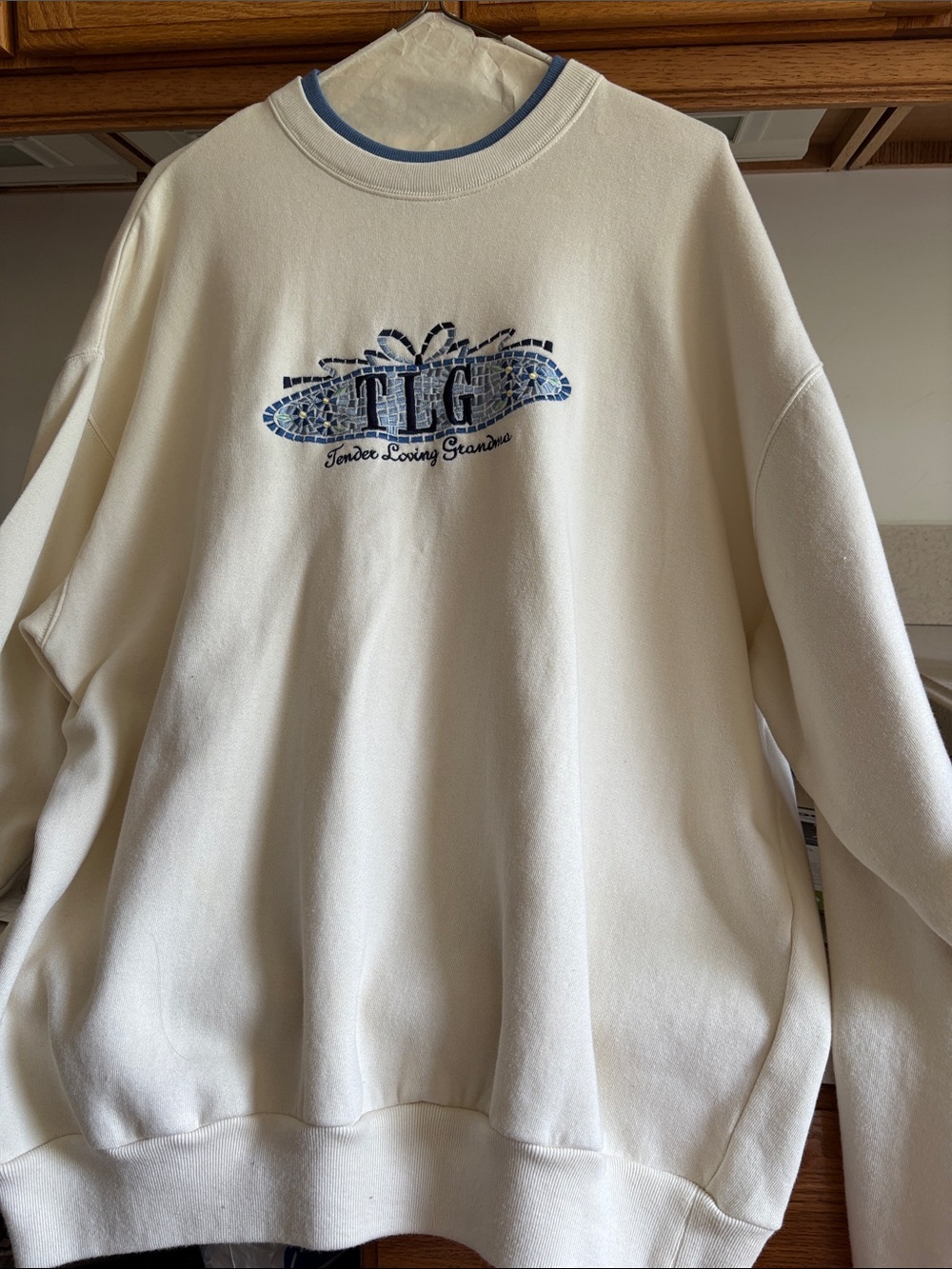 TLC Embroidered Cream Pullover Sweatshirt